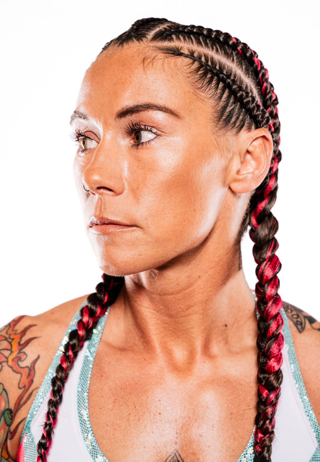 Close-up portrait of Brooke Evans with braided hair
