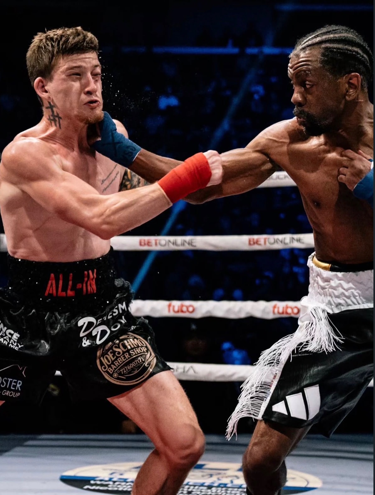 Jamel Herring firing a punch through his opponent's guard