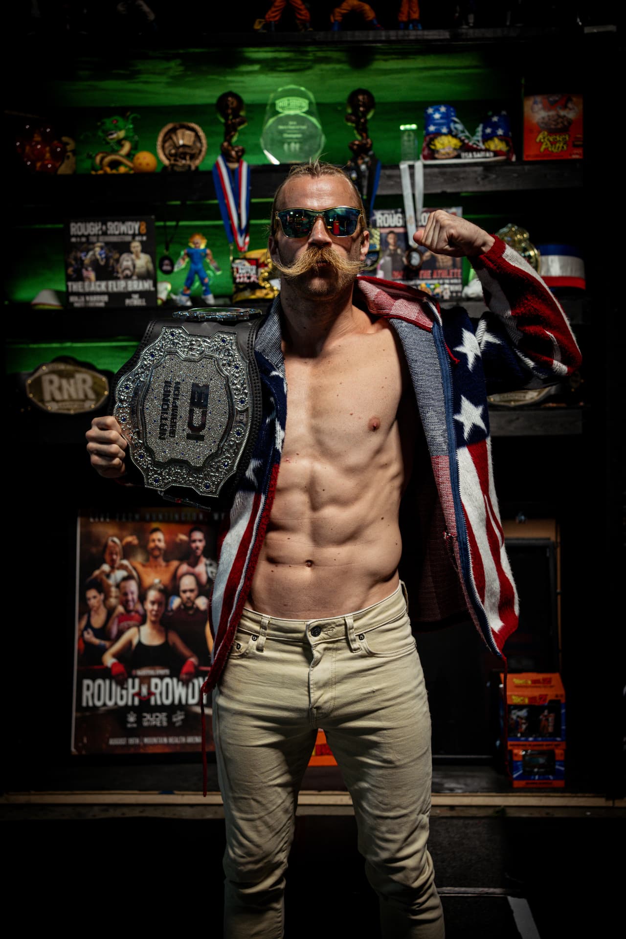 Brendan Kelly holding his national championship belt