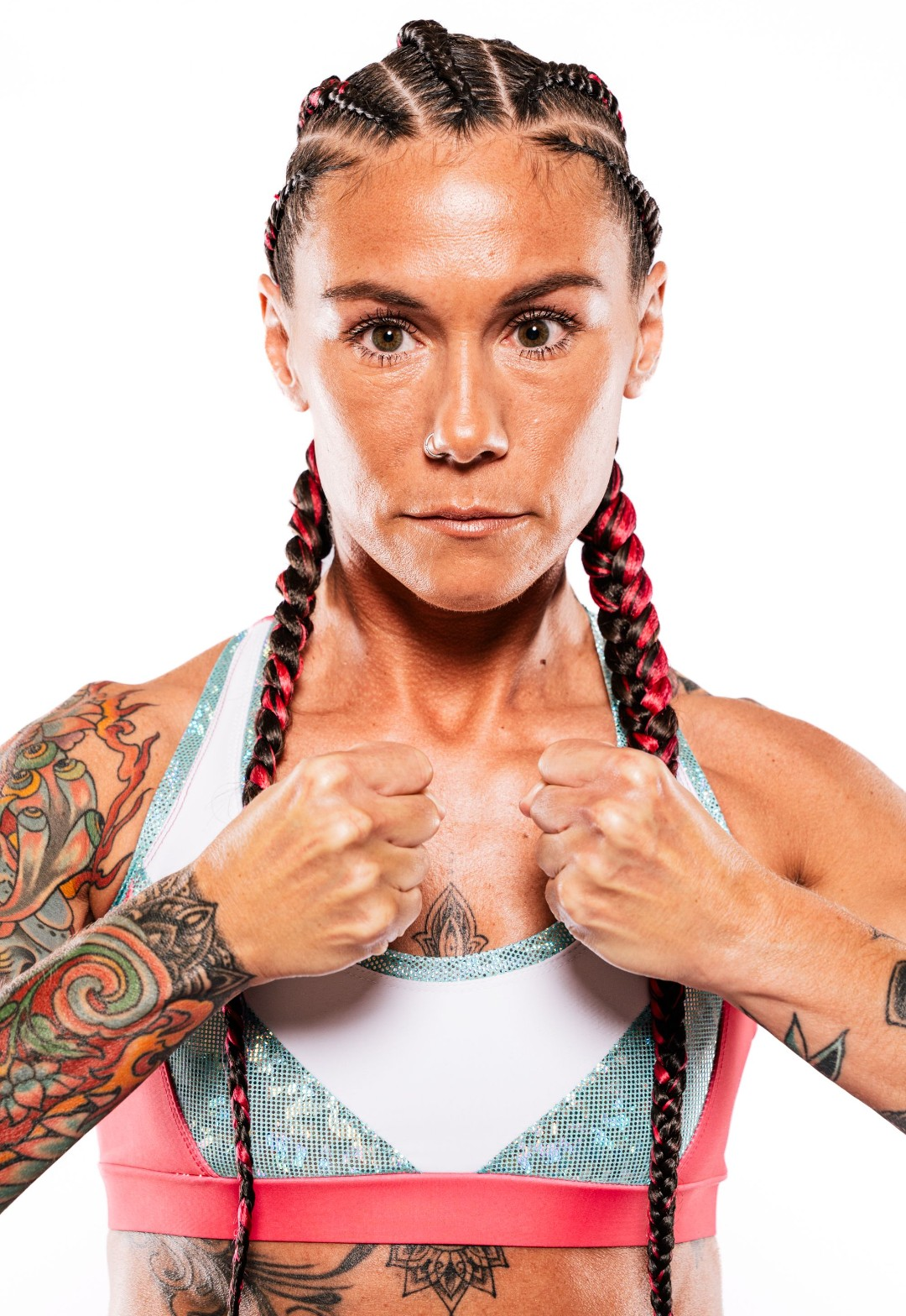 Brooke Evans in a fighting stance with fists raised