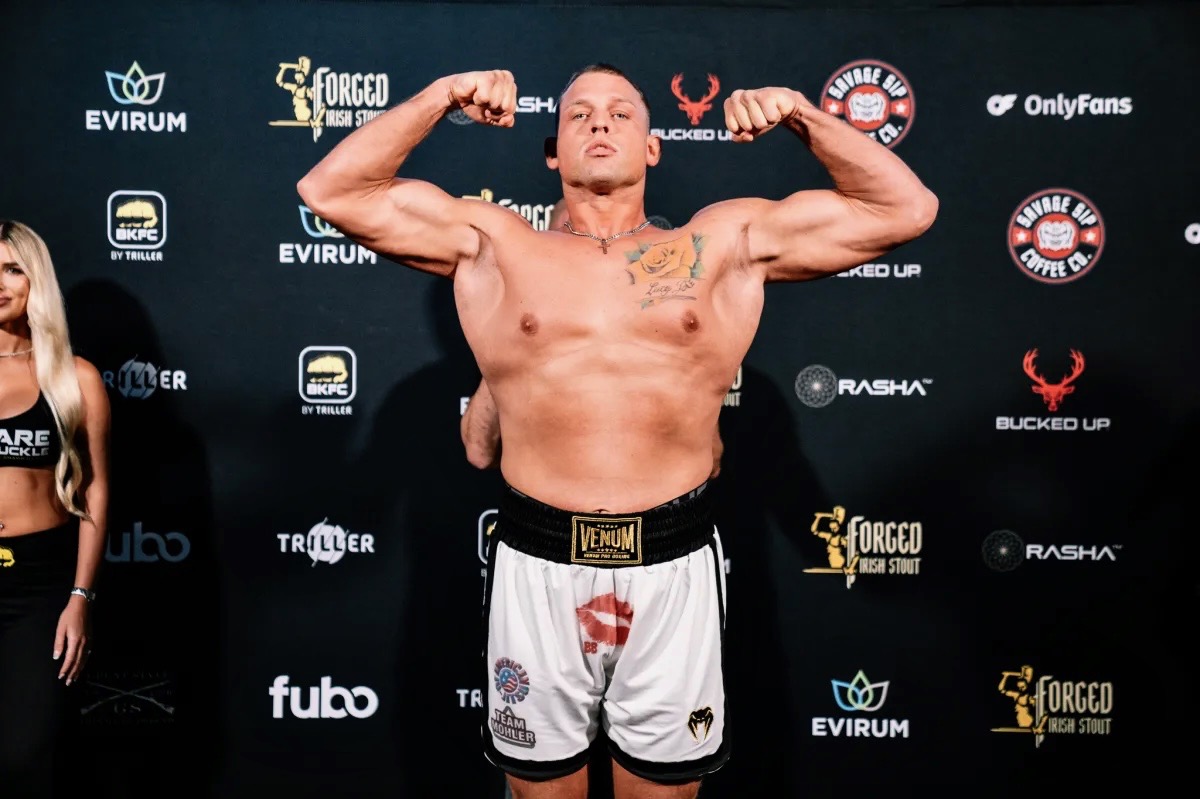 Anthony Garrett flexing at the BKFC weigh-in