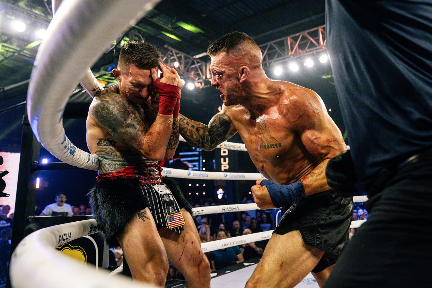 Dustin Pague pressuring his opponent in the ring