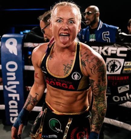Jessica Borga celebrating inside the BKFC ring