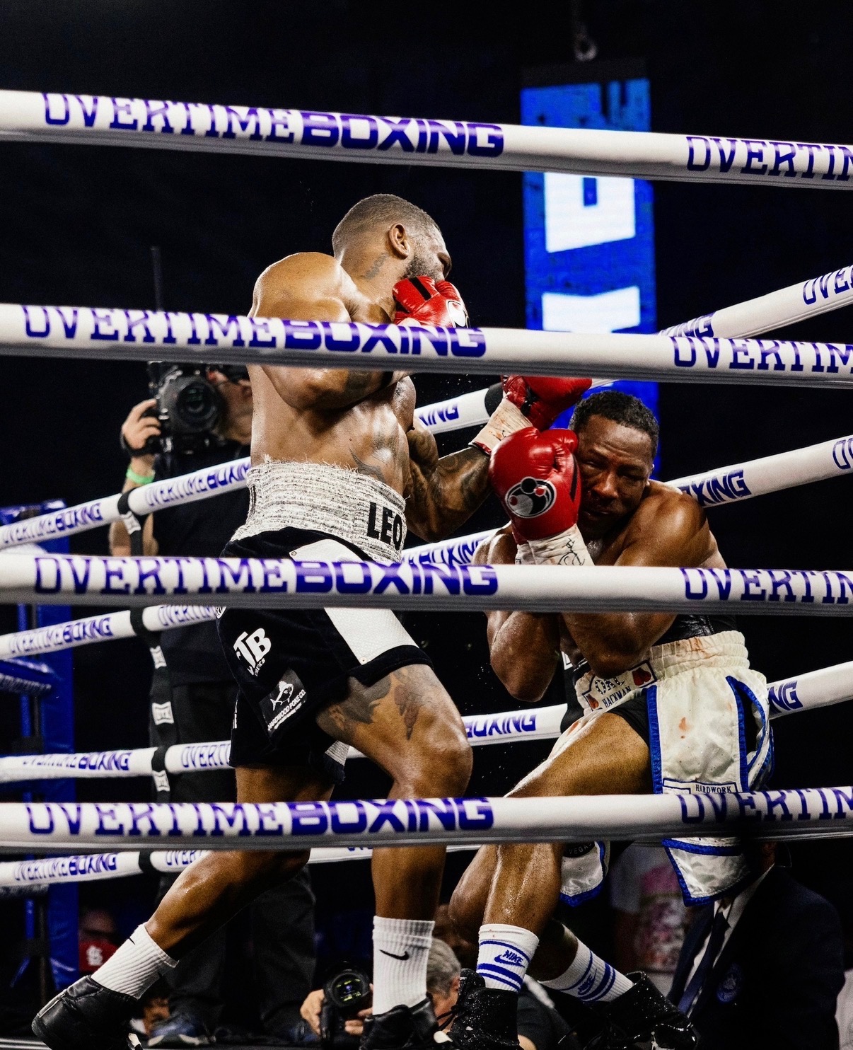 Kurt Scoby backing his opponent against the ropes on an Overtime Boxing card