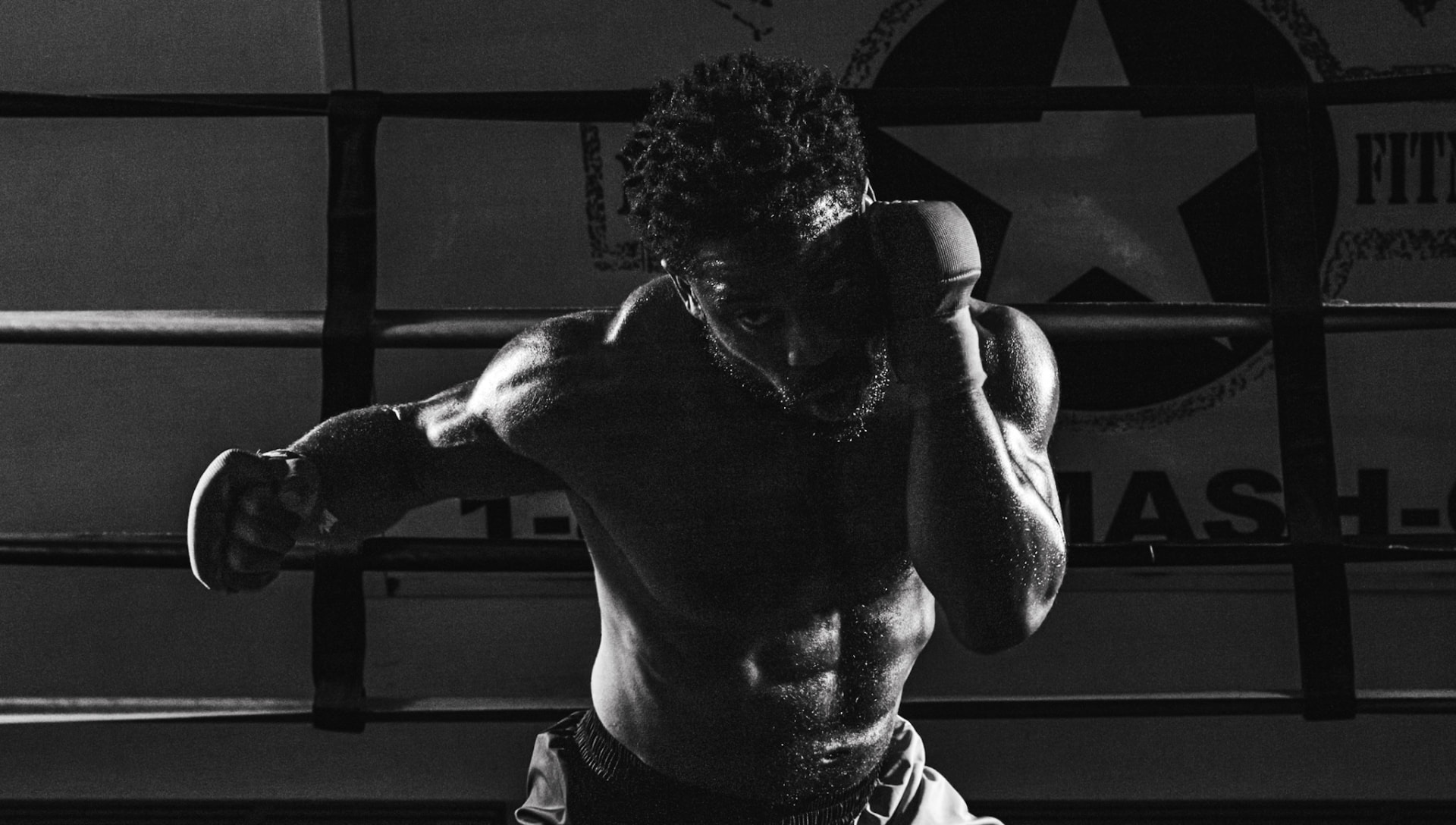 Devin Thomas throwing a punch in the ring
